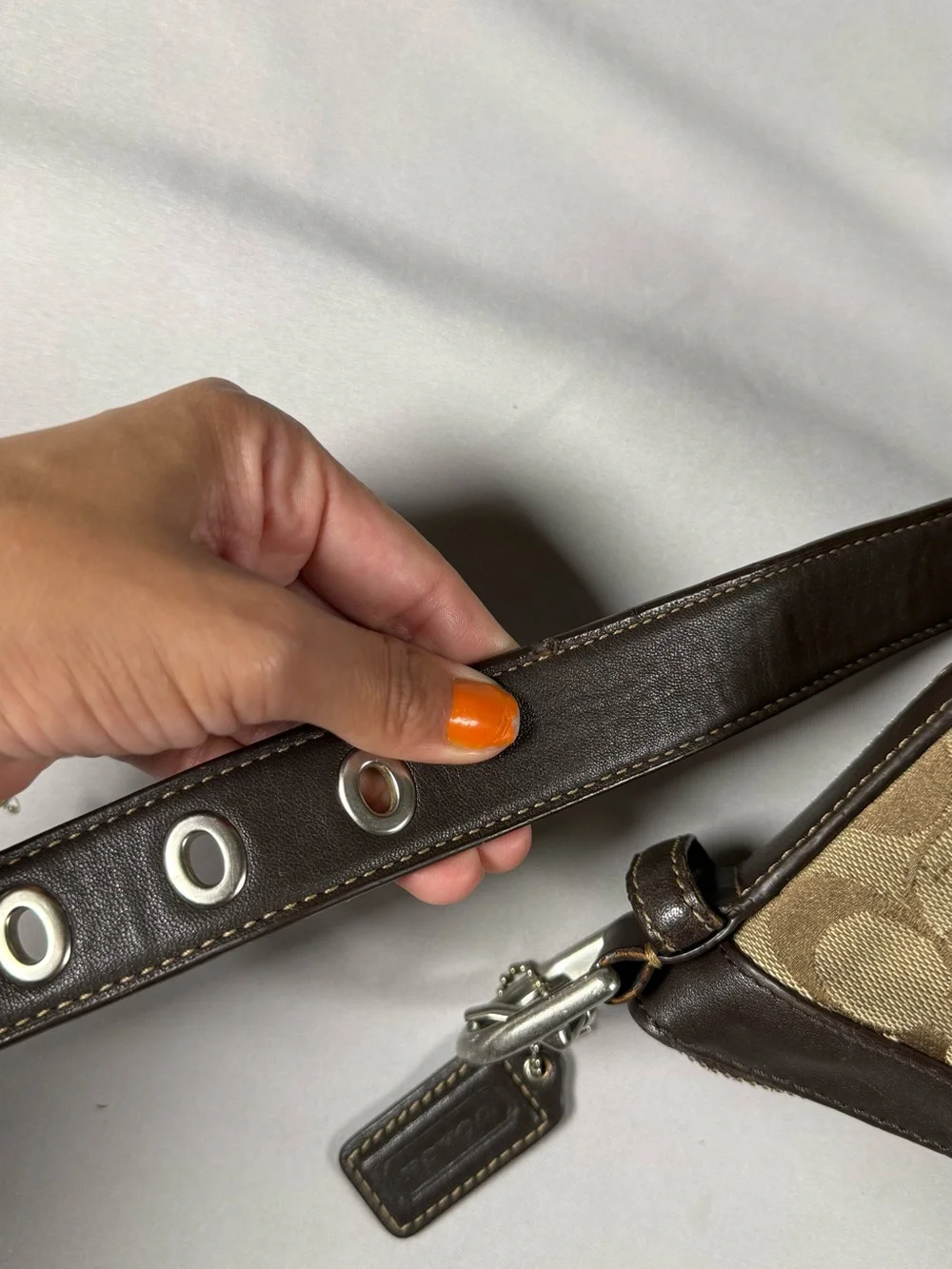 vintage Y2K-era signature canvas and leather hobo/shoulder bag